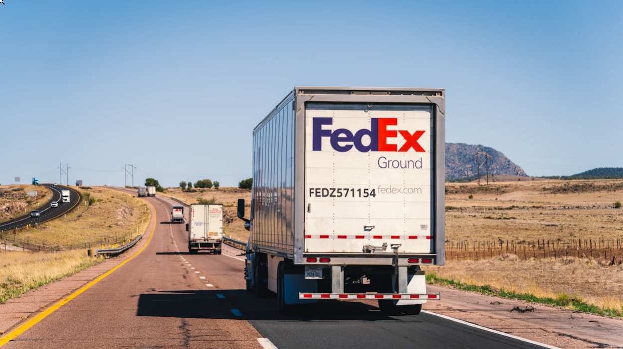 E&L REGALADO TRUCKING LLC semi truck on the road